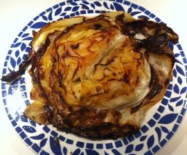 photo of roasted cabbage steak on plate